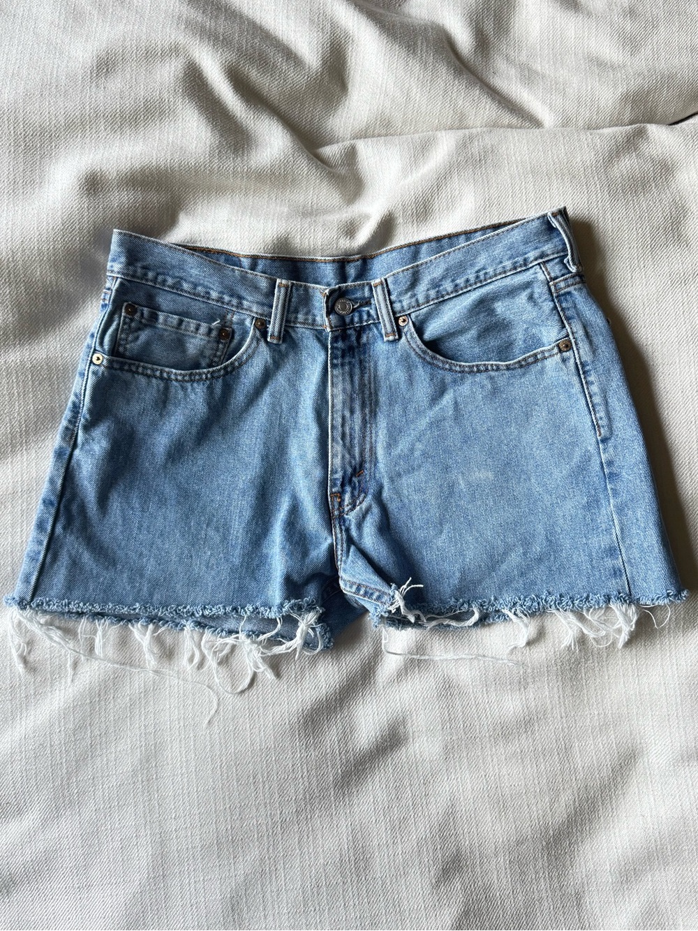 Levi’s Cutoff Denim Shorts Medium Light Wash Raw Hem